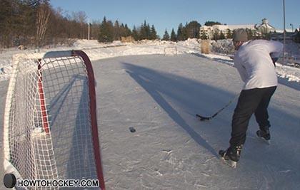 how to take a back hand shot in hockey